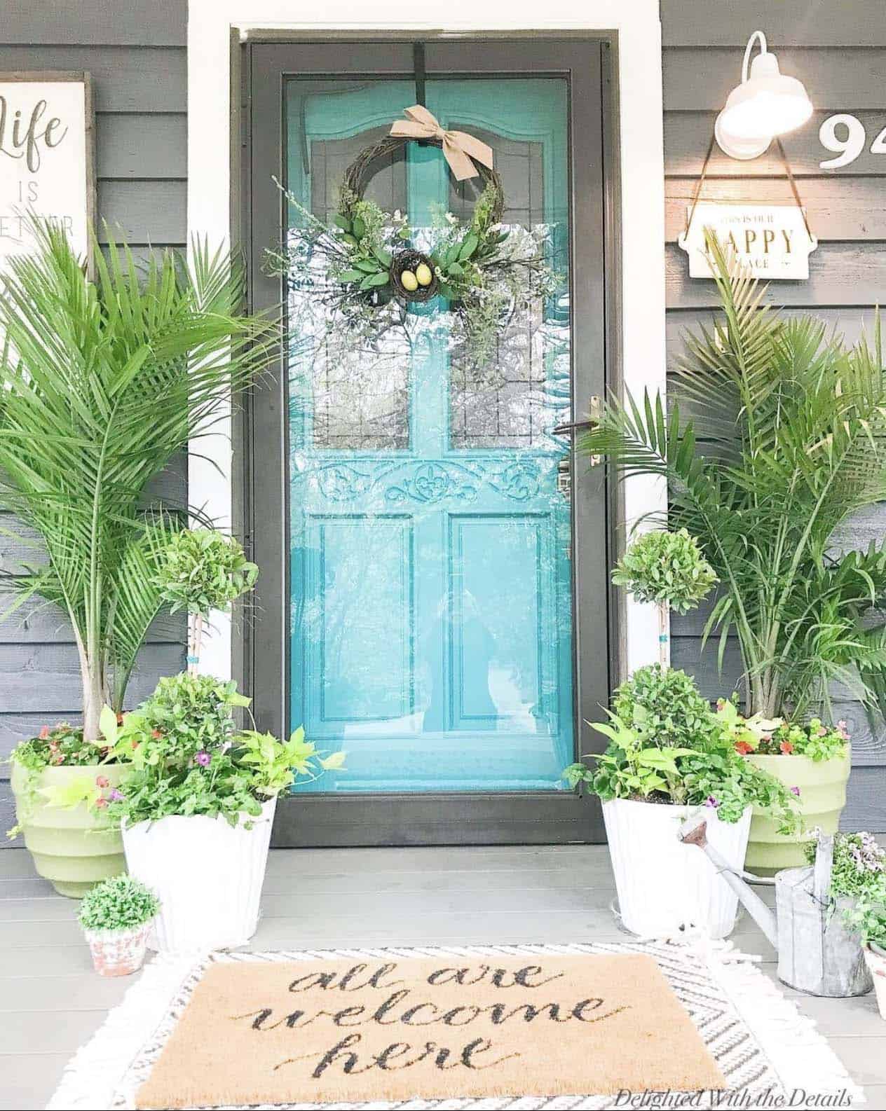 Spring porch decoration with a blue door