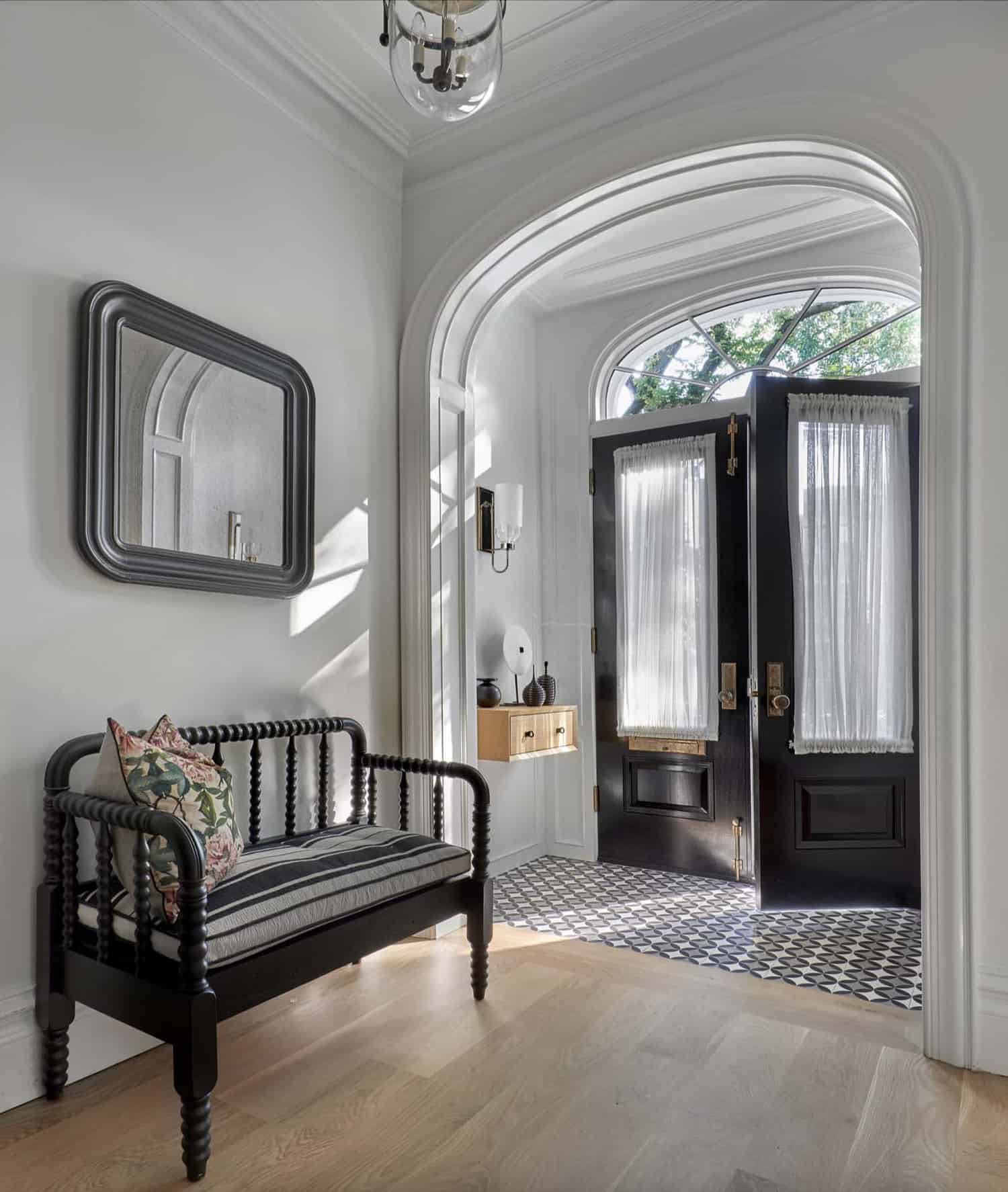 Elegant Victorian style house entrance with arched door