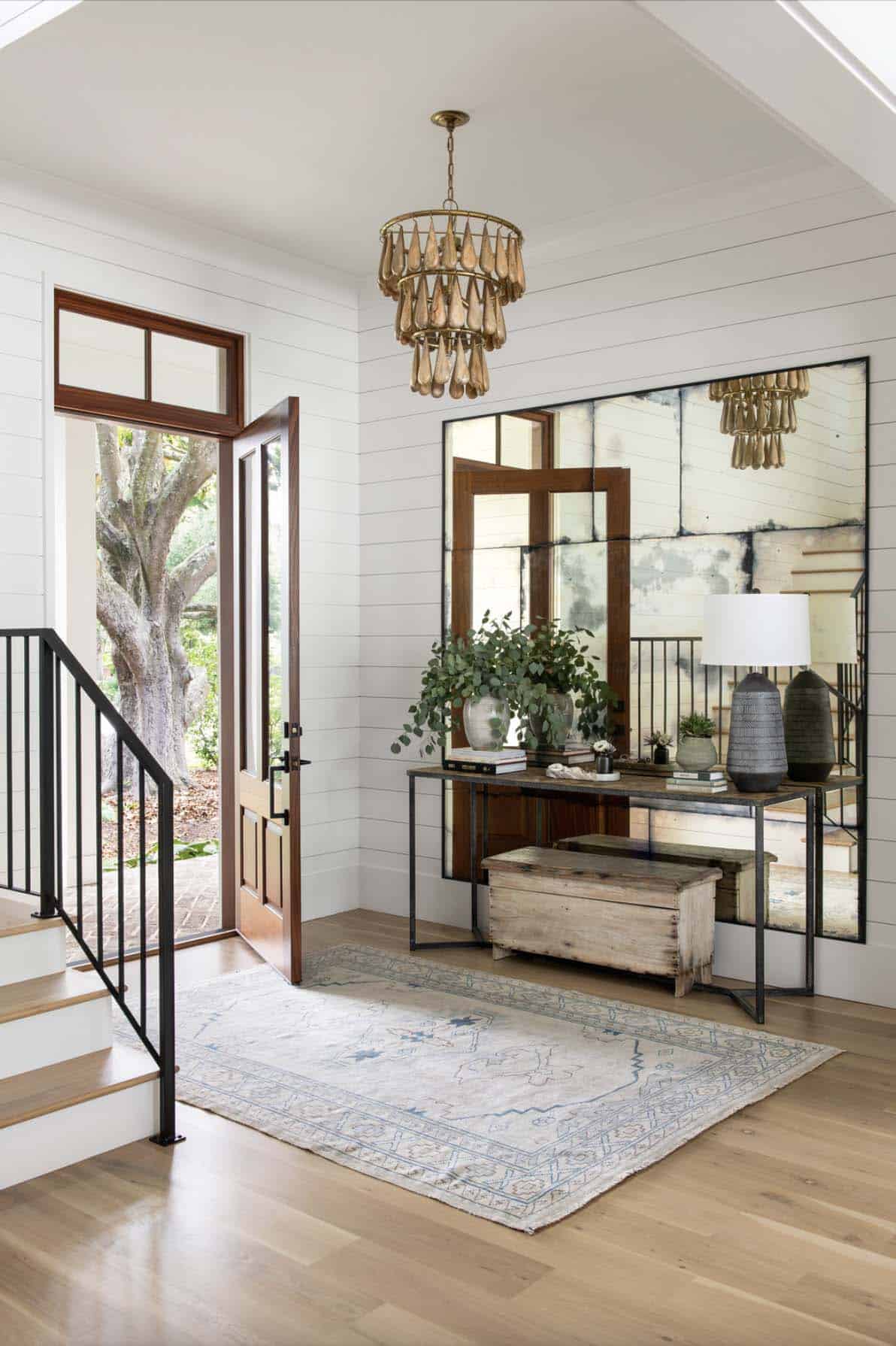 House entrance with large mirror