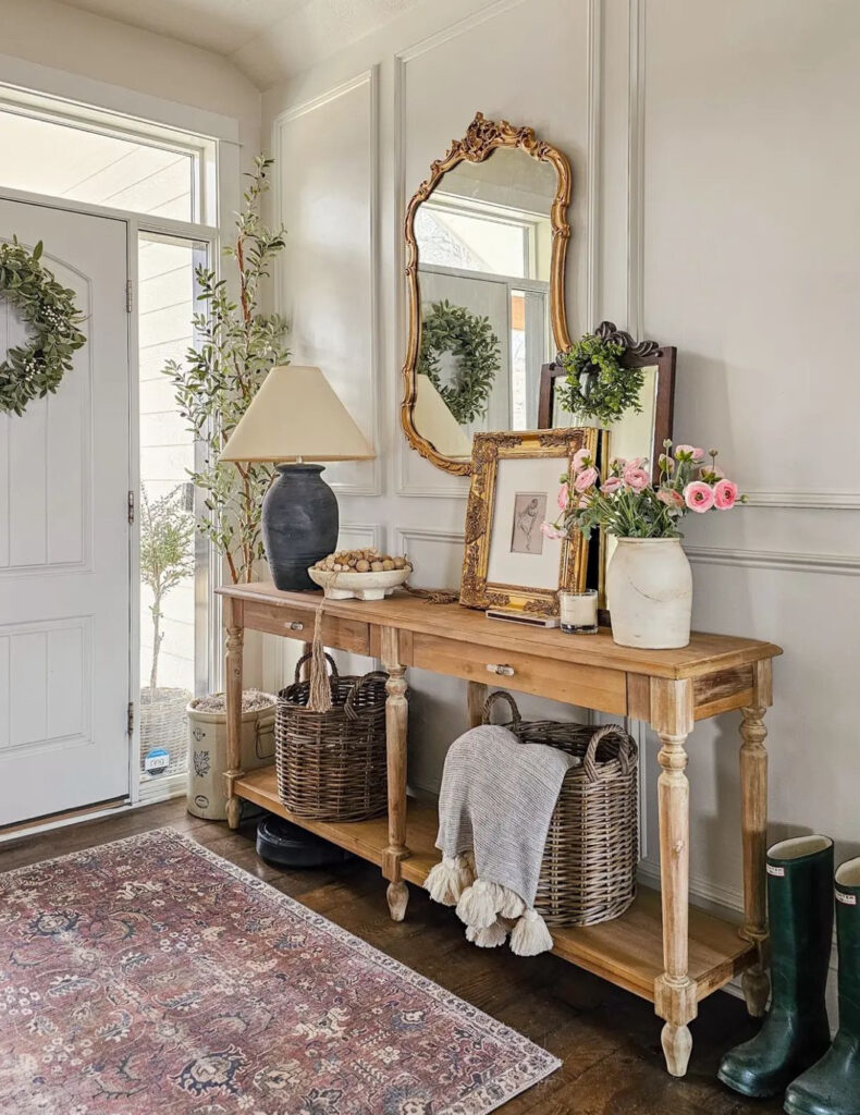 Vintage farmhouse style entry table with gold accents