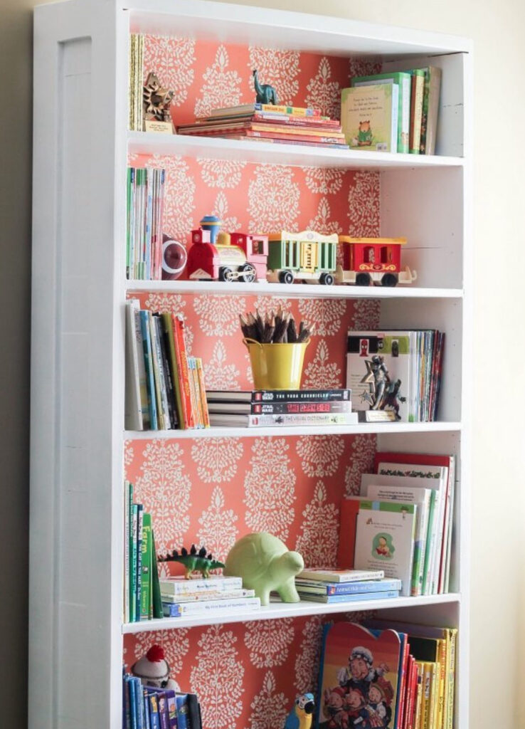 Bright wallpaper with a coral pattern in the built-in children's room