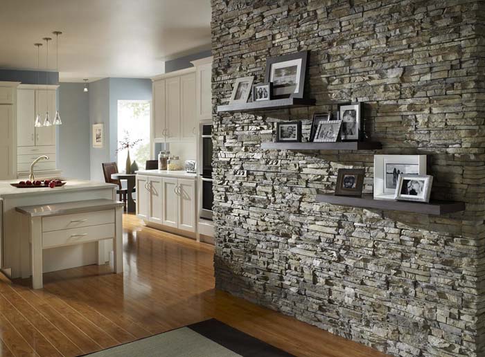 Transition wall with stone cladding