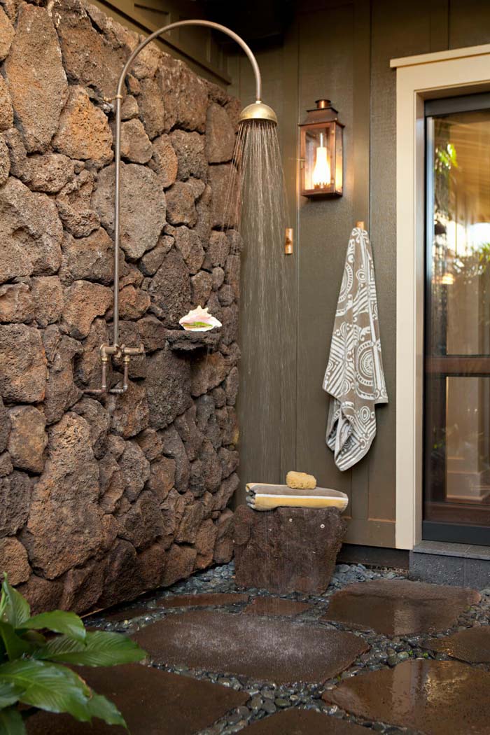Outdoor shower corner with stones