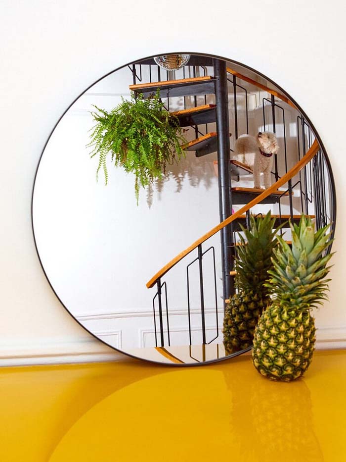 A mirror that reflects a spectacular decorative element