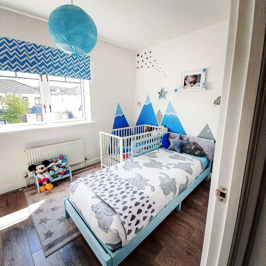 small boy's room with wall design 