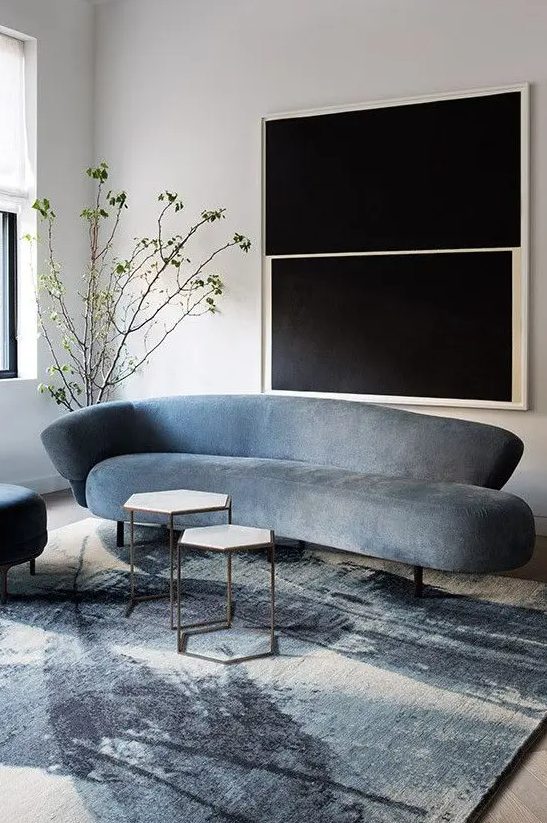 Even if your sofa is not curved but has a curved back, it brings out cool lines and silhouettes and looks stunning