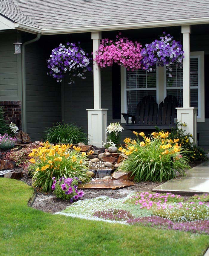 Landscaping around the house with water feature