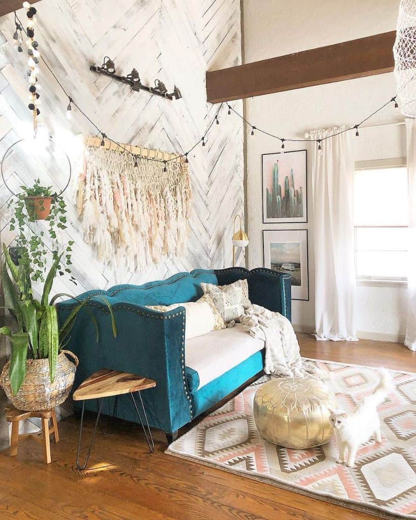 Boho living room blue couch cat
