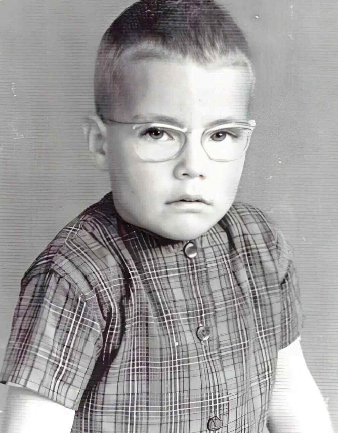 Can You Identify This Young Boy Who Later Became a Worldwide Icon?