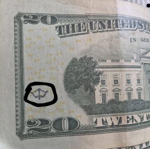 Why a Small Symbol on the $20 Bill Reveals Hidden Traditions Behind U.S. Currency