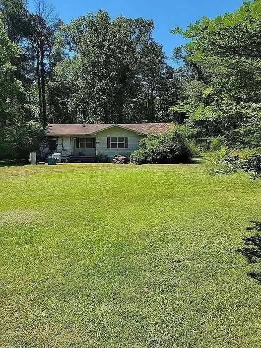 Secluded Home Tucked Away on a Peaceful Dead-End Road Offers Privacy and Charm