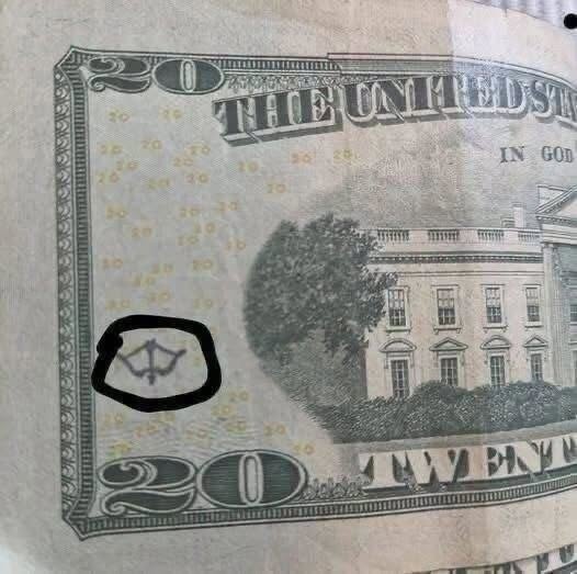 Why Does Your $20 Bill Have a Tiny Bow-and-Arrow Shape? The Real Reason Behind the Mysterious Mark